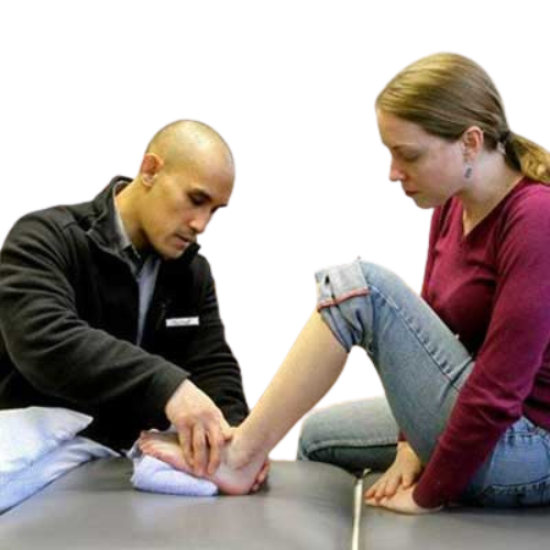 jarlo doing physical therapy on a patient